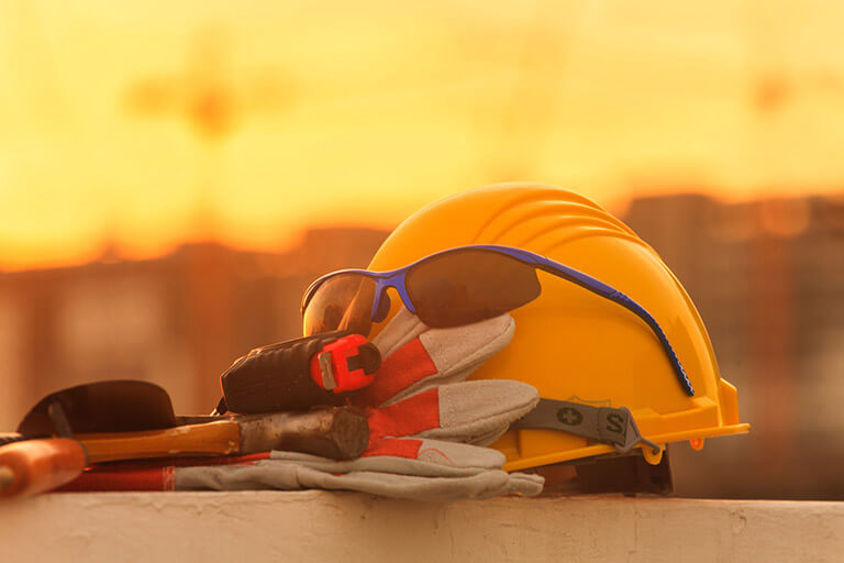 A hard hat left at a construction site