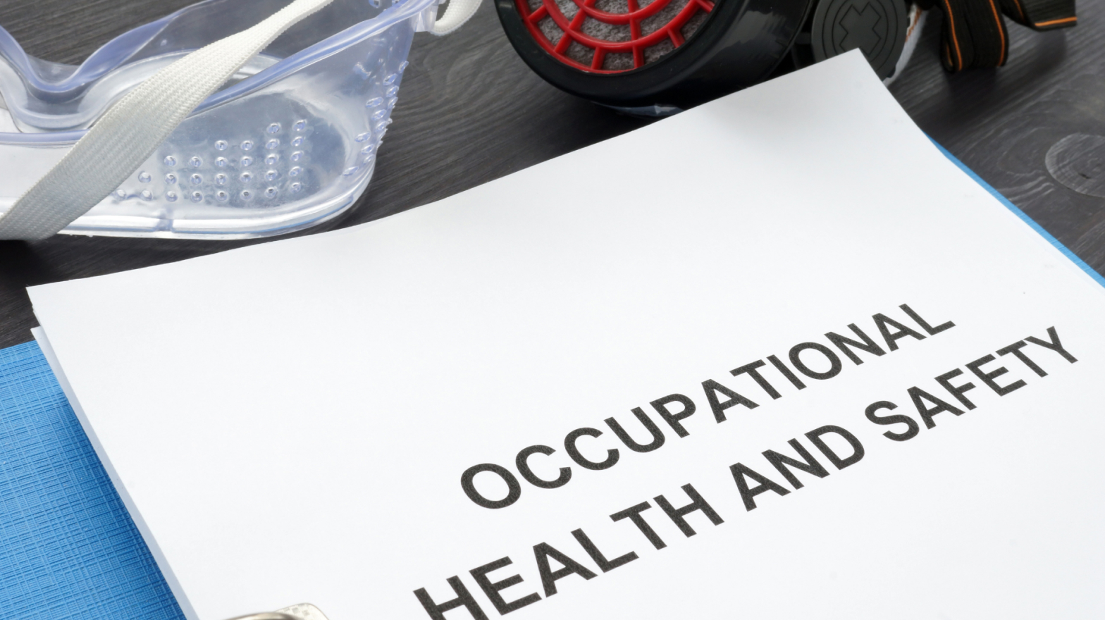 Occupational health and safety documents in a binder