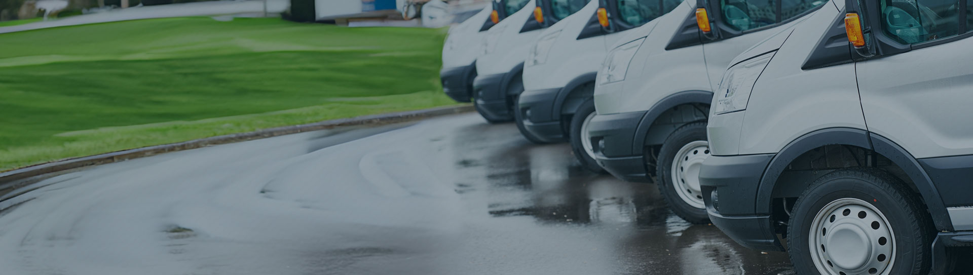 A lineup of commercial vehicles on a lot